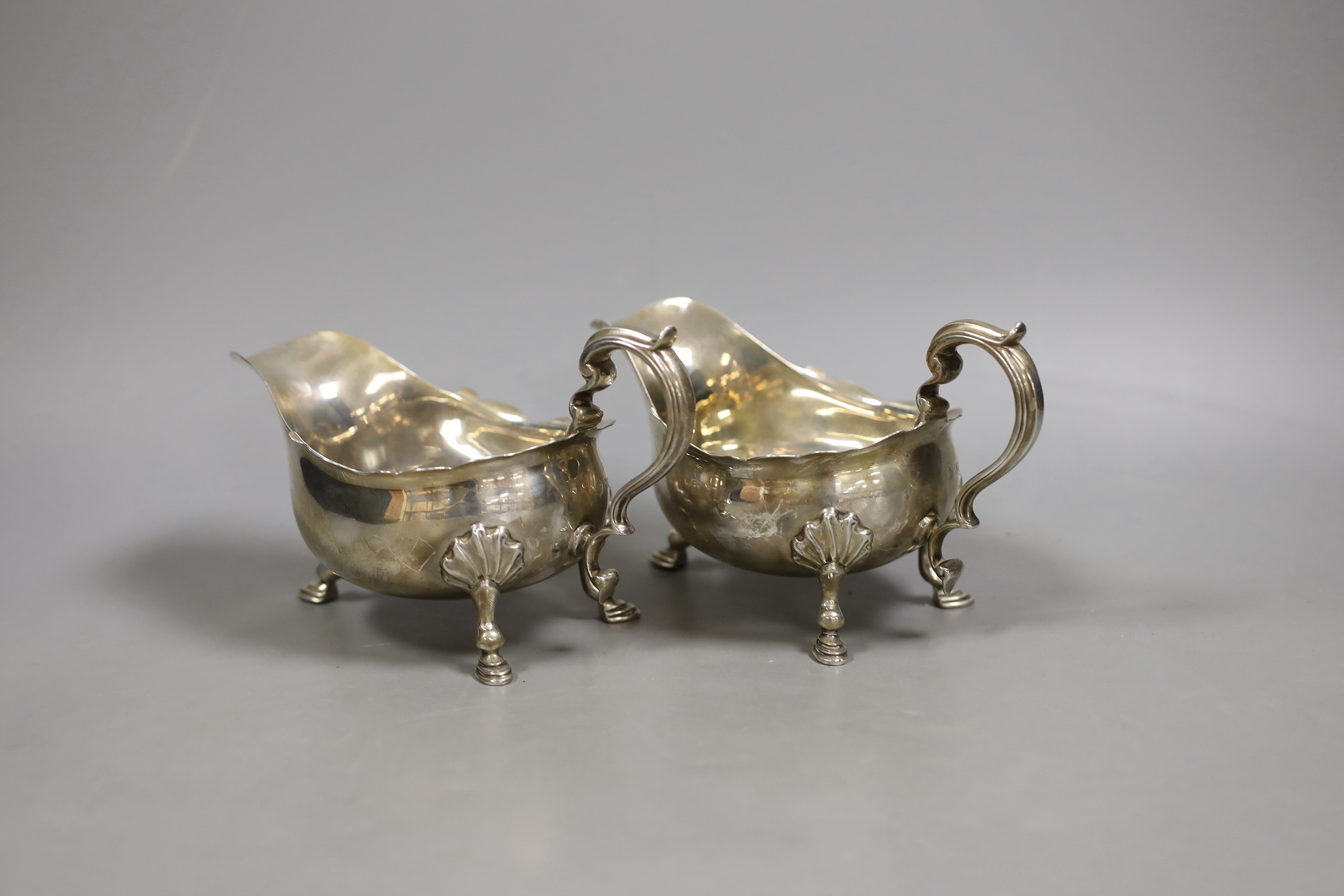A pair of George V silver sauceboats, P.G. Dodd & Son, London, 1927, 15oz.